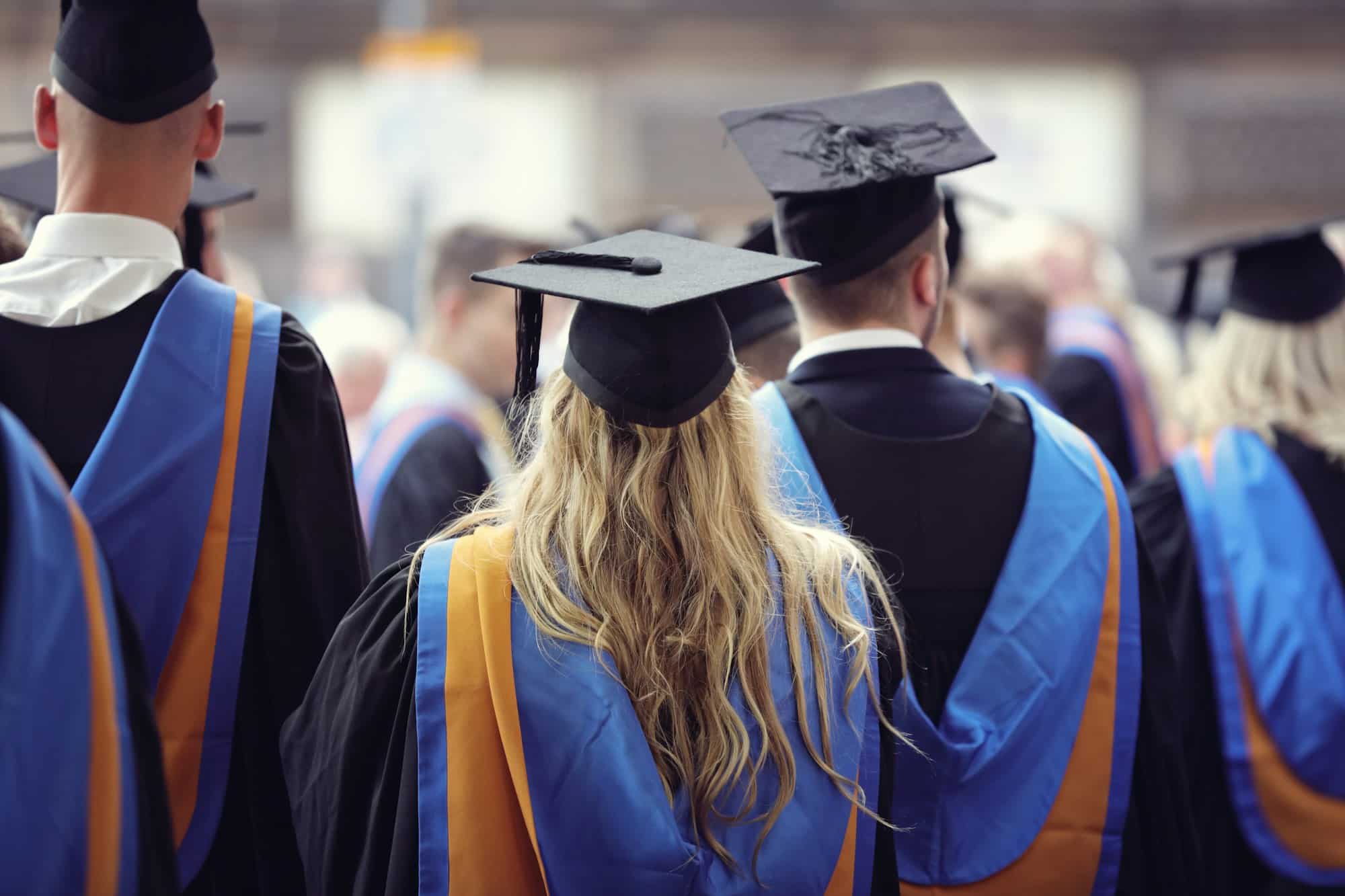 University graduates at graduation ceremony